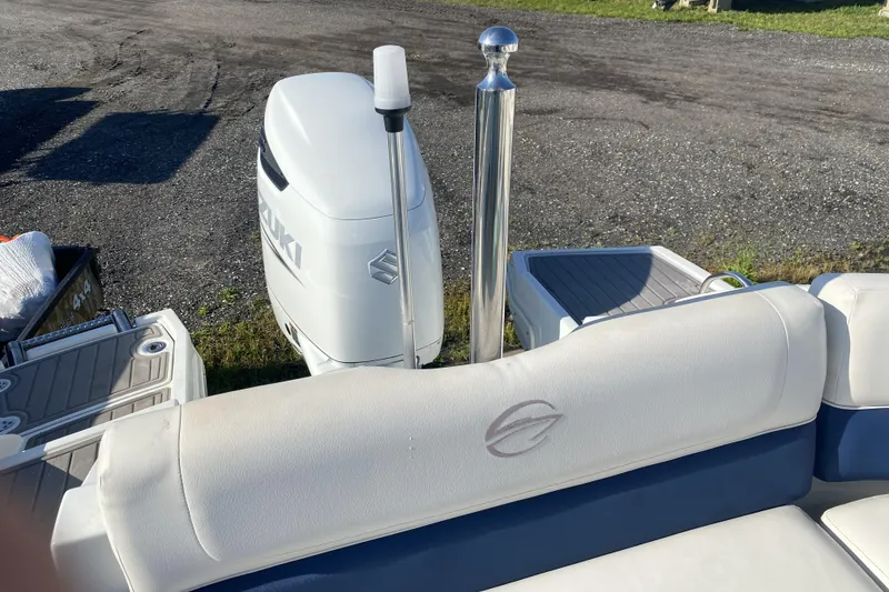 Slide: The Image of 2017 Crownline Eclipse E2 XS boat with Suzuki outboard motor, rear seating view. - 6