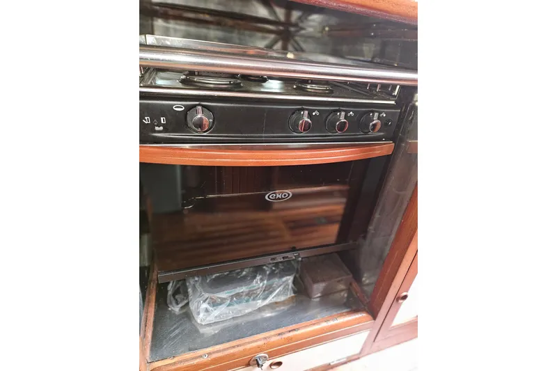 Slide: The Image of 1982 Kadey-Krogen 38 yacht kitchen with Eno stove and oven. - 13