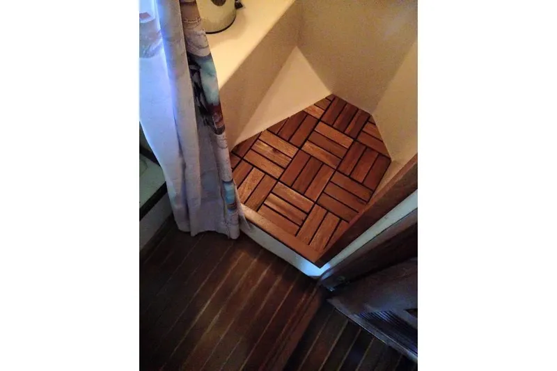 Slide: The Image of Interior of 1982 Kadey-Krogen 38 Dual Centerboard with wooden flooring and shower area. - 6