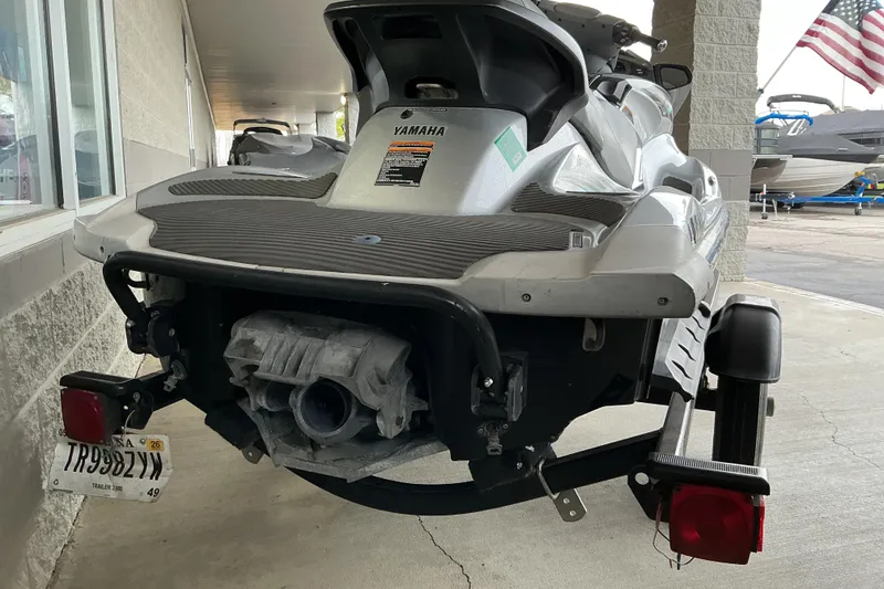 Slide: The Image of 2008 Yamaha WaveRunner FX Cruiser SHO on trailer, rear view with American flag in background. - 10