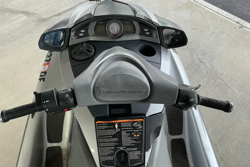 Slide: The Image of 2008 Yamaha WaveRunner FX Cruiser SHO dashboard and handlebars, showcasing controls and display. - 8