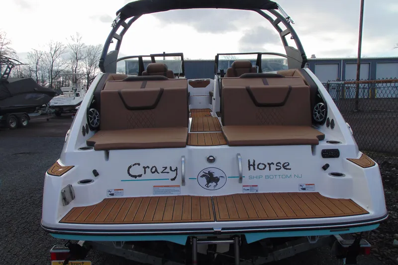 Slide: The Image of 2024 Yamaha Boats 222SD with "Crazy Horse" name, featuring spacious seating and sleek design. - 4