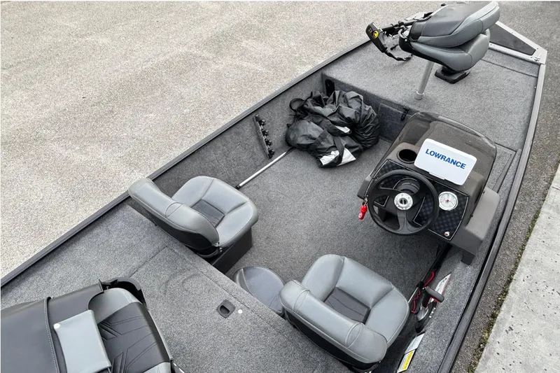 Slide: The Image of 2020 Tracker Bass Tracker Classic XL boat interior with seating and Lowrance equipment. - 10