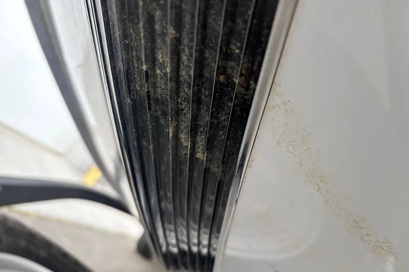 Slide: The Image of Close-up of a 2020 Tracker Bass Tracker Classic XL boat detail, showing textured surface. - 2