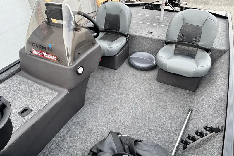 Slide: The Image of 2020 Tracker Bass Tracker Classic XL boat interior with seats and steering console. - 5