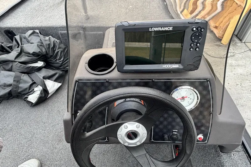 Slide: The Image of 2020 Tracker Bass Tracker Classic XL dashboard with Lowrance fish finder and RPM gauge. - 7