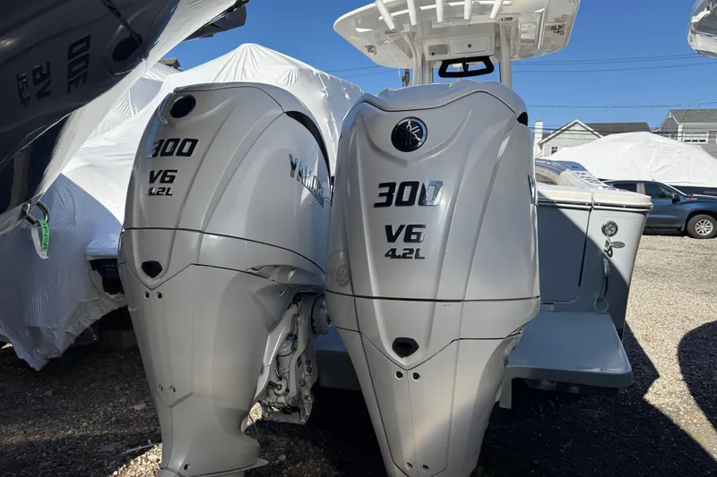 Slide: The Image of Twin Yamaha 300 V6 4.2L outboard engines on a 2023 Regulator 28 boat. - 20