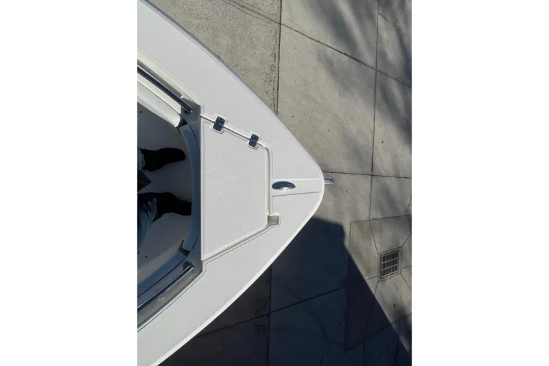 Slide: The Image of Top view of 2026 Bulls Bay 255 Center Console boat on pavement. - 10