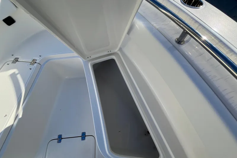 Slide: The Image of 2026 Bulls Bay 255 Center Console boat storage compartment, open and spacious design. - 26