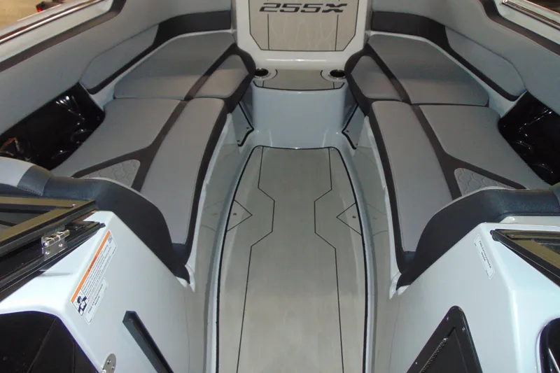 Slide: The Image of 2024 Yamaha Boats 255XD interior with sleek seating and modern design. - 11