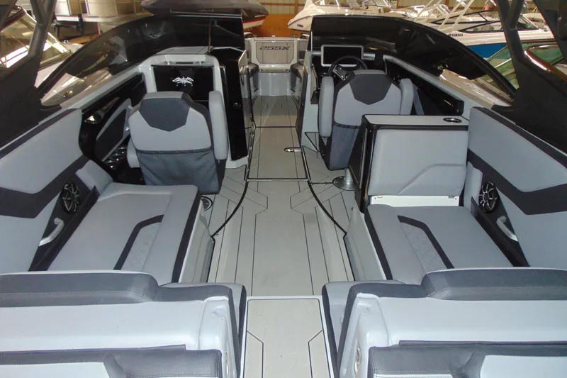 Slide: The Image of 2024 Yamaha Boats 255XD interior with sleek seating and modern design. - 4