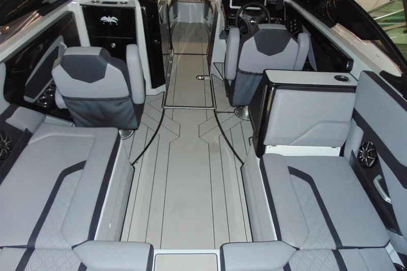 Slide: The Image of 2024 Yamaha Boats 255XD interior with modern seating and sleek design. - 5