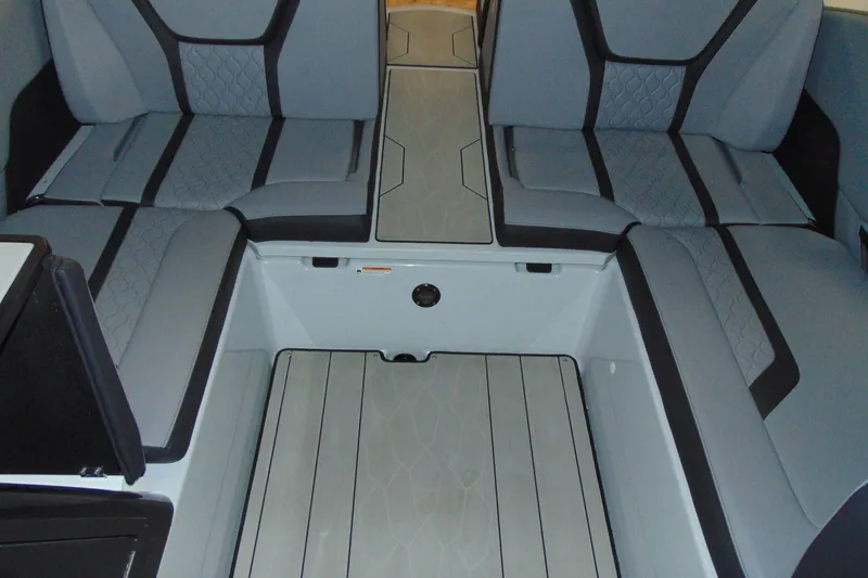 Slide: The Image of 2024 Yamaha Boats 255XD interior seating with modern design and comfortable upholstery. - 8