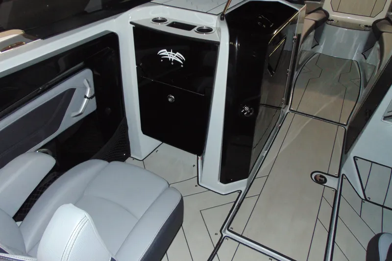 Slide: The Image of 2024 Yamaha Boats 255XD interior with sleek seating and modern design. - 9