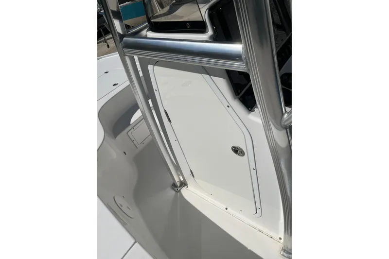 Slide: The Image of 2019 Sea Hunt BX 22 BR boat interior with sleek white finish and metal framework. - 13