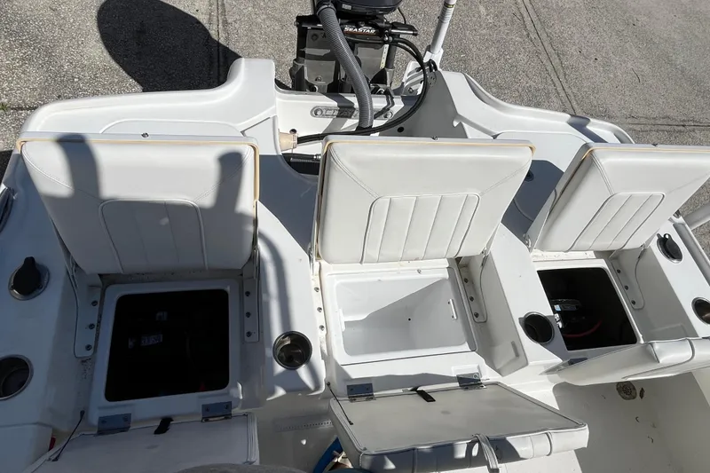 Slide: The Image of 2019 Sea Hunt BX 22 BR boat interior with open storage compartments. - 21