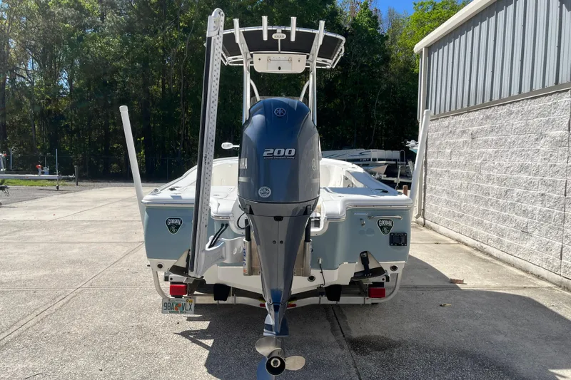 Slide: The Image of 2019 Sea Hunt BX 22 BR boat with Yamaha 200 engine, parked outdoors. - 7