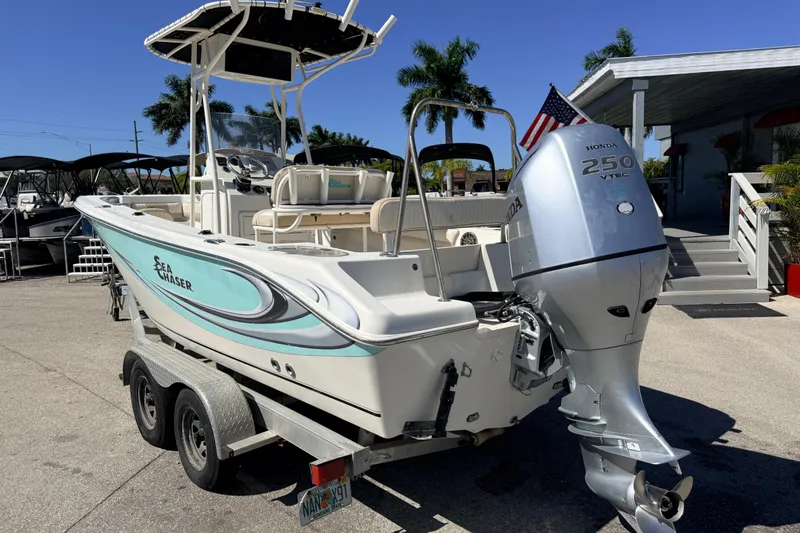 Slide: The Image of 2015 Sea Chaser 22 HFC boat with Honda 250 VTEC engine on trailer. - 11