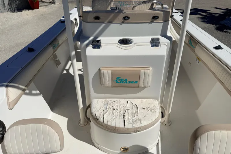 Slide: The Image of 2015 Sea Chaser 22 HFC boat interior with seating and storage compartments. - 16