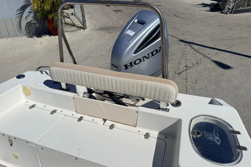 Slide: The Image of 2015 Sea Chaser 22 HFC boat with Honda outboard motor, rear seating view. - 19