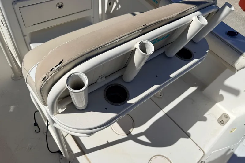 Slide: The Image of 2015 Sea Chaser 22 HFC boat seat with rod holders and storage compartment. - 24