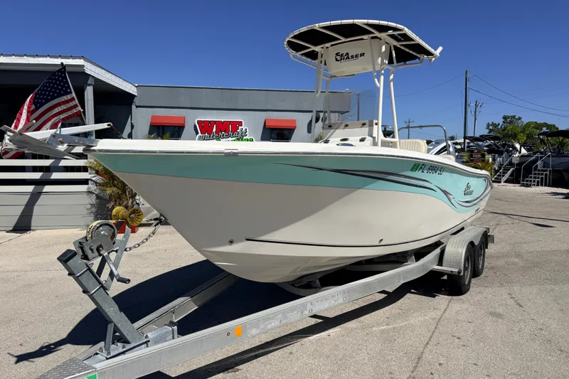 Slide: The Image of 2015 Sea Chaser 22 HFC boat on trailer, parked outside WMF Watercraft. - 3