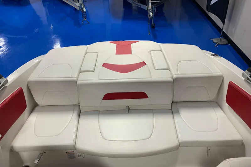 Slide: The Image of 2017 Chaparral 21 H2O Sport boat interior with white and red seating. - 6