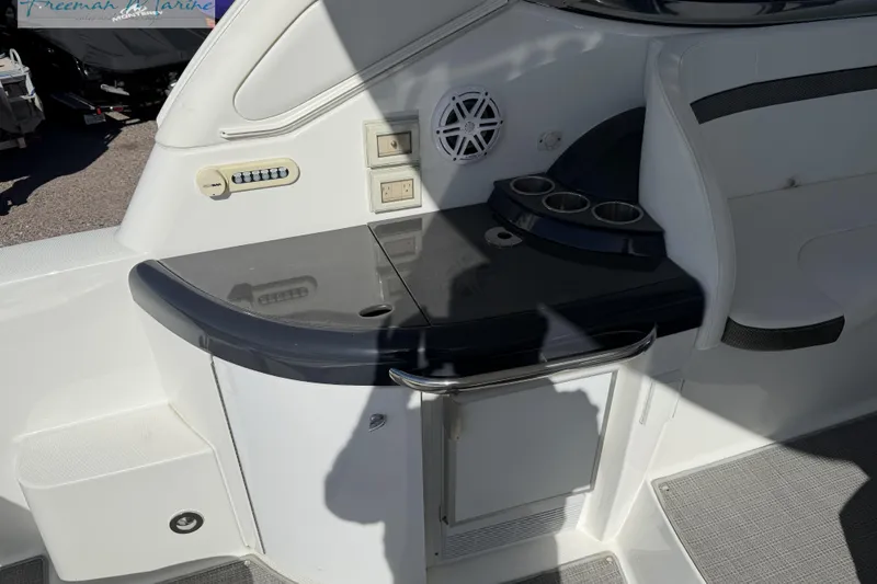 Slide: The Image of 2018 Formula 34 Performance Cruiser interior with counter, cup holders, and control panel. - 16