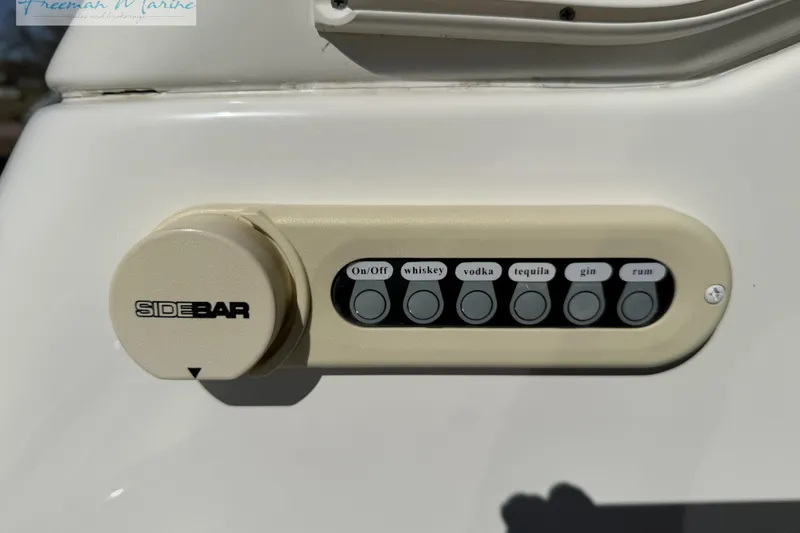 Slide: The Image of Control panel on 2018 Formula 34 Performance Cruiser with labeled drink buttons. - 17