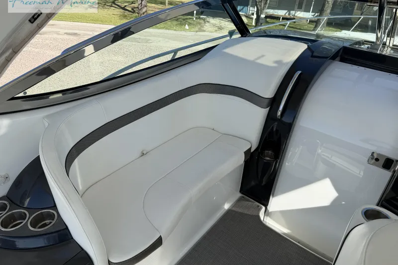 Slide: The Image of 2018 Formula 34 Performance Cruiser interior with white seating and cup holders. - 20
