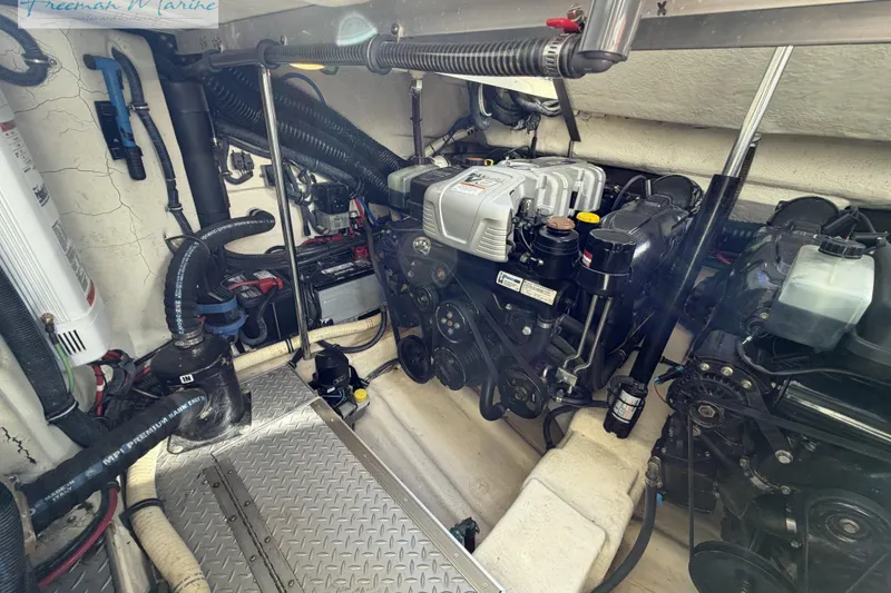 Slide: The Image of Engine room of a 2018 Formula 34 Performance Cruiser, showcasing mechanical components and systems. - 26