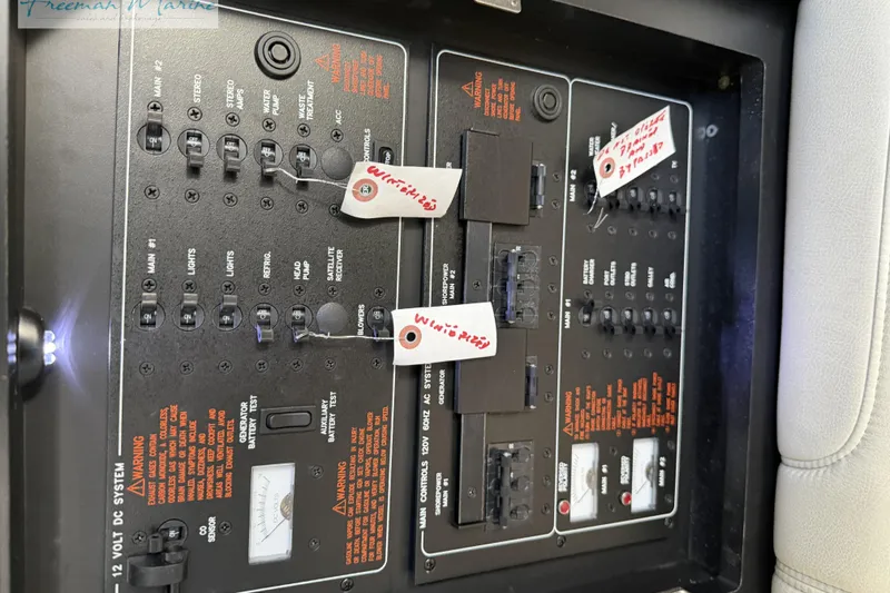 Slide: The Image of Electrical control panel on a 2018 Formula 34 Performance Cruiser boat. - 28