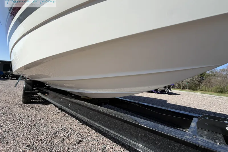 Slide: The Image of 2018 Formula 34 Performance Cruiser on trailer, side view, outdoors. - 3