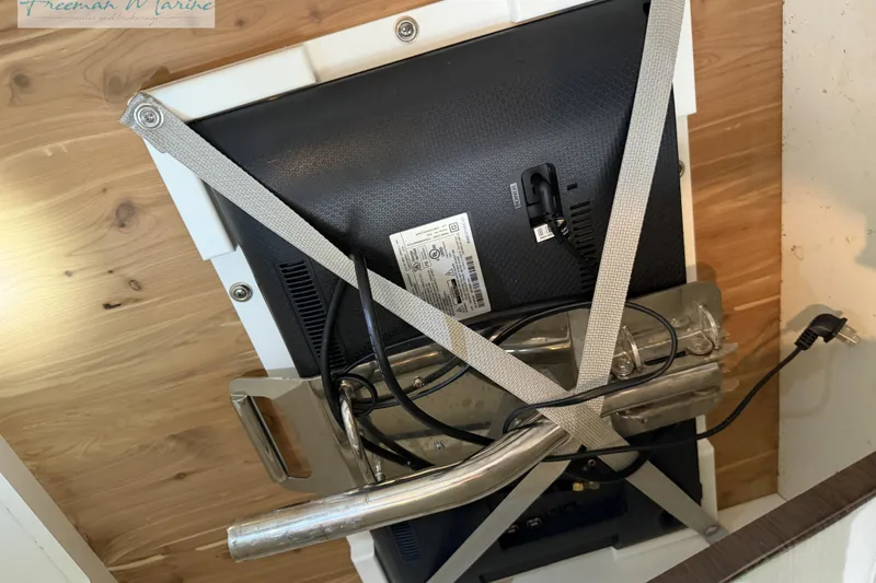 Slide: The Image of Securely mounted TV with straps in 2018 Formula 34 Performance Cruiser. - 31