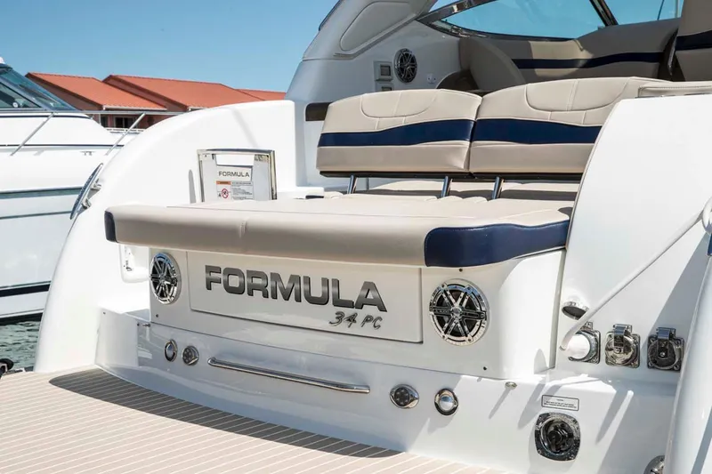 Slide: The Image of Manufacturer Provided Image: 2018 Formula 34 Cruiser yacht, rear view with seating and branding. - 37