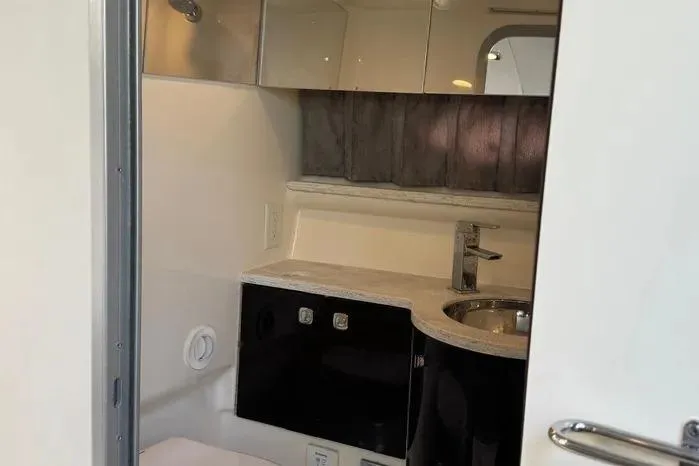 Slide: The Image of Interior of 2017 Formula 400 Super Sport yacht bathroom with modern fixtures and sleek design. - 16