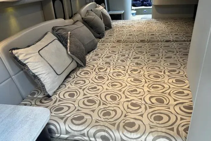 Slide: The Image of Luxurious interior of 2017 Formula 400 Super Sport with patterned bedding and plush pillows. - 18