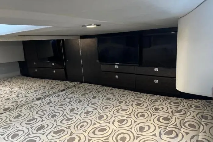 Slide: The Image of Interior of 2017 Formula 400 Super Sport with modern cabinetry and patterned flooring. - 19