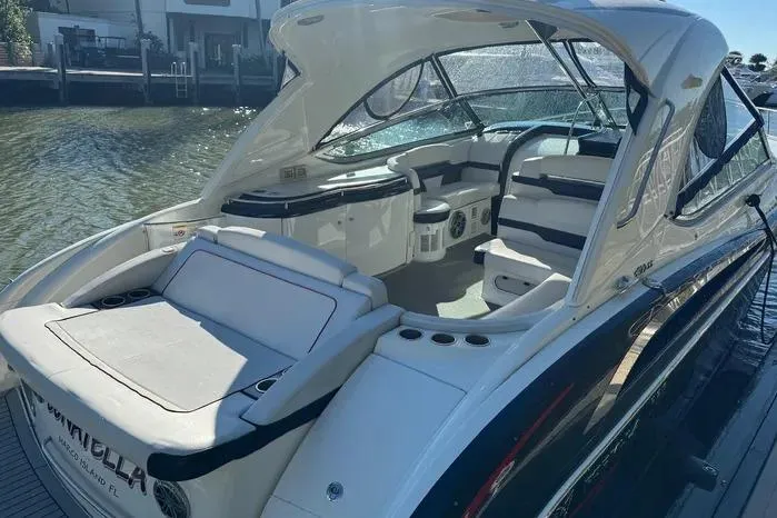 Slide: The Image of 2017 Formula 400 Super Sport boat with sleek interior and waterfront view. - 23