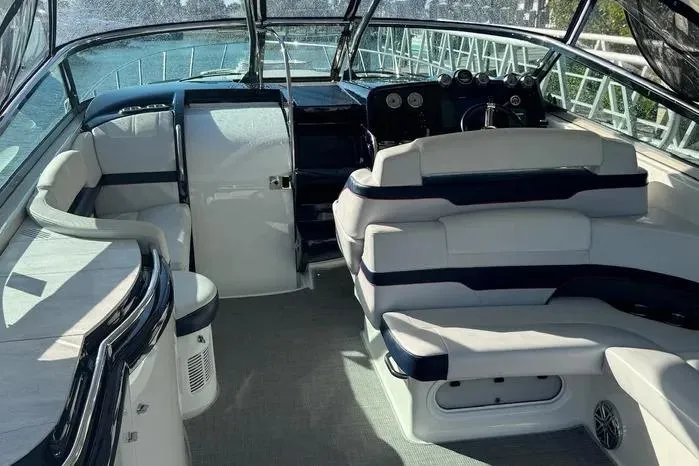 Slide: The Image of 2017 Formula 400 Super Sport boat interior with luxurious seating and modern dashboard. - 28