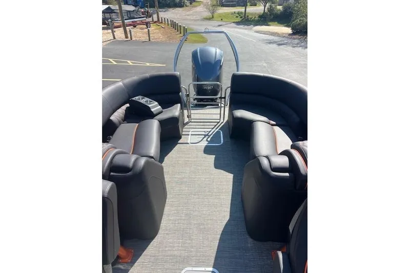 Slide: The Image of 2024 Bennington 23 RXFBA pontoon boat interior with plush seating and modern design. - 12