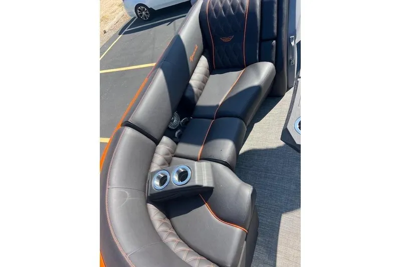 Slide: The Image of Luxurious seating on 2024 Bennington 23 RXFBA boat with cup holders and stylish design. - 7