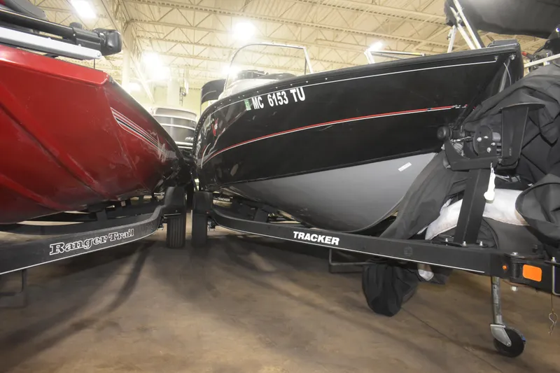 Slide: The Image of 2015 Tracker Targa 18 WT boat on trailer in indoor storage facility. - 3