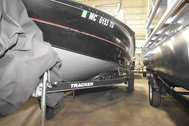 Slide: The Image of 2015 Tracker Targa 18 WT boat on trailer in storage facility. - 6