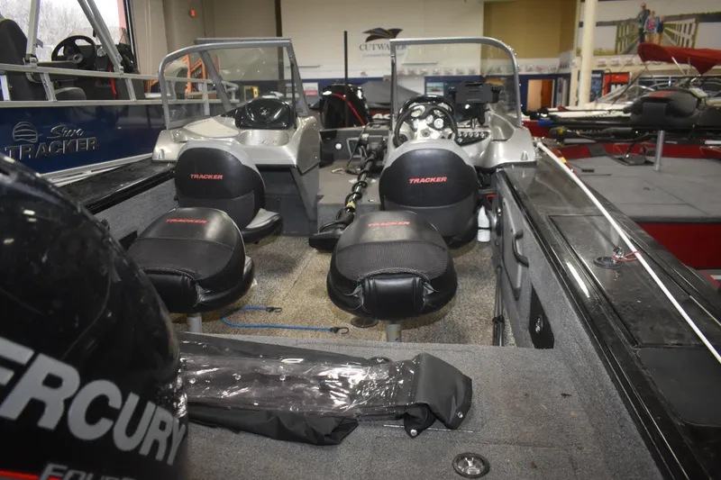 Slide: The Image of 2015 Tracker Targa 18 WT boat interior with seating and controls. - 8