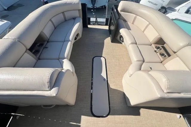 Slide: The Image of Open storage compartment on 2019 Harris Cruiser 250 boat seat. - 13