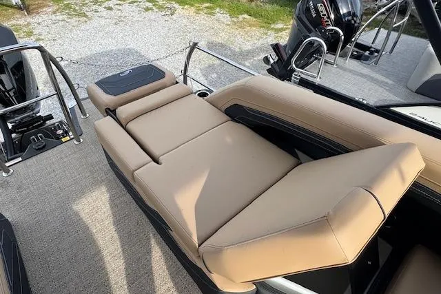 Slide: The Image of 2026 Barletta Cabrio 24M boat with luxurious tan seating and modern design. - 16