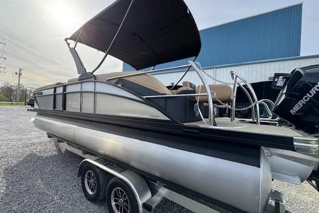 Slide: The Image of 2026 Barletta Cabrio 24M pontoon boat on trailer, featuring sleek design and modern amenities. - 4