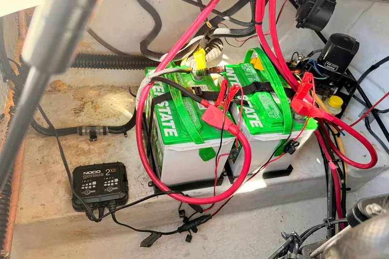 Slide: The Image of Battery setup in a 2005 Crownline 270 BR boat with NOCO Genius charger. - 10