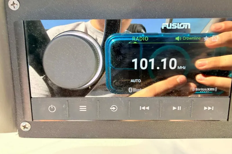 Slide: The Image of Fusion radio display on a 2005 Crownline 270 BR, tuned to 101.10 MHz. - 11